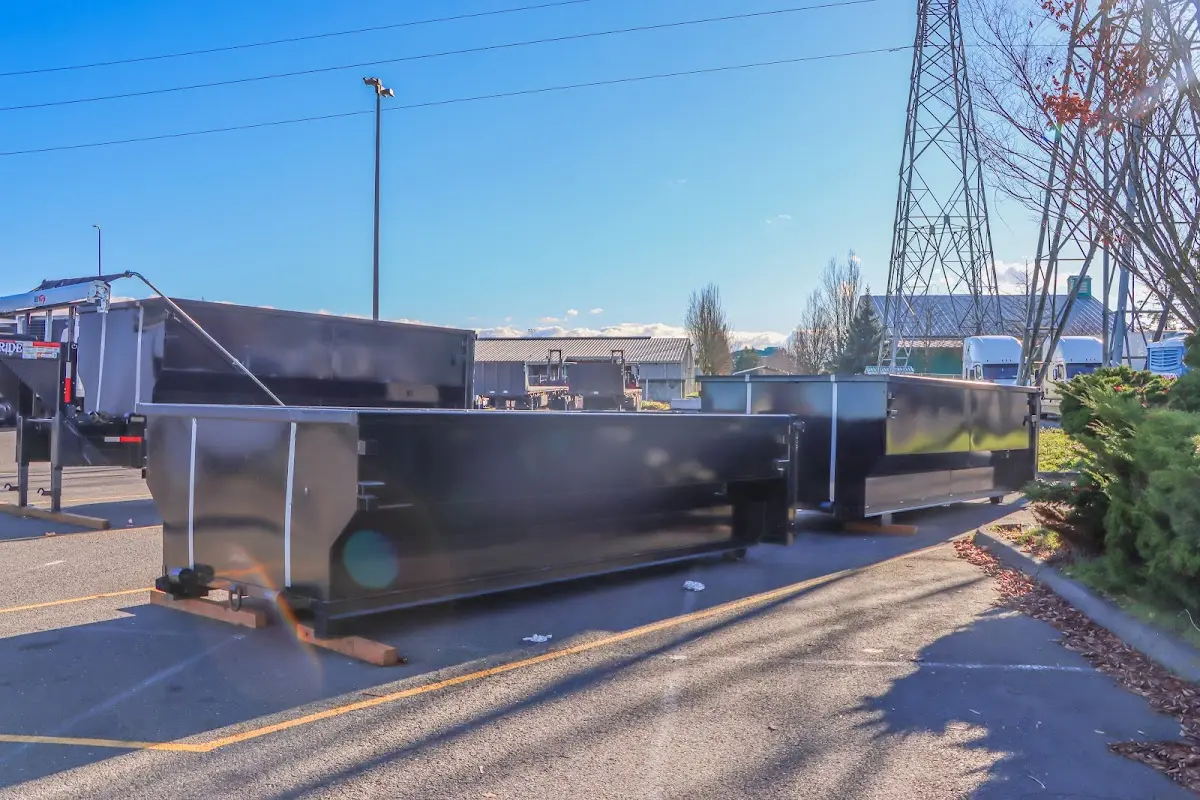 Roll-off dumpster ready for waste disposal at job site for Construction Dumpster Rental in Wilmington
